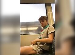 Cute boy on a train
