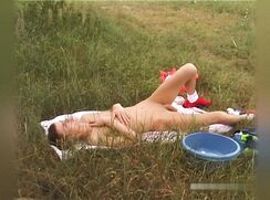 Young twink in the grass