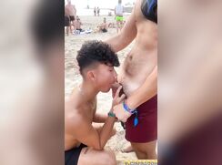 Man fucks in the mouth of a boy on the beach