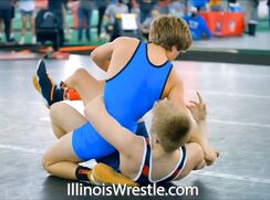 Two sexy boys wrestling in tight swimsuits.