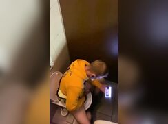 Spying on cocky guys jerking off in the toilet