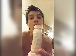 Cute boy fist and use huge toys