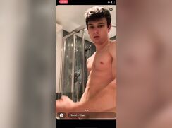 Muscle boy in hoody strips and wanks