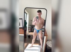 Lucas inserts a dildo in his ass in front of the mirror