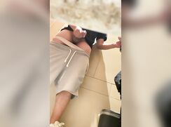 Spying on a young cumming guys in Asia's toilet