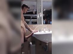 argentinian hung peeing hard on  cock