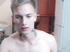 cute blonde guy at night