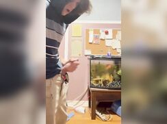 Twink cums in room with Aquarium