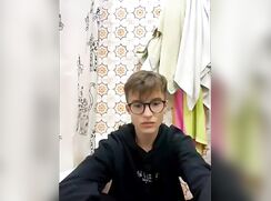 Cute boy in glasses cums in bathroom