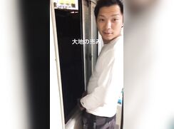 A male is pissing from the window to outside.