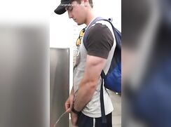 Older brother pissing