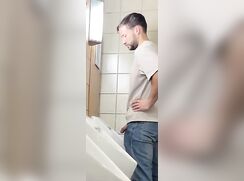 Caught peaking at urinal cock