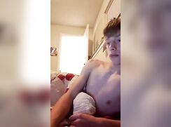 Bros shoots his cum while buddy in the room