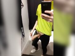 German with Big Dick cums on the mirror in the fitting room in the store