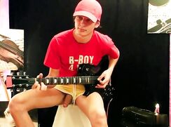 cute play guitar before wanks