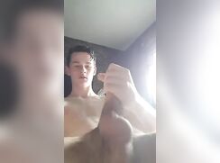 fit guy wanking and playing ass on bed