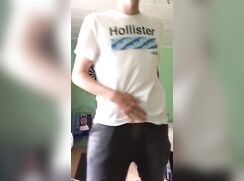 Blond boy shows his ass