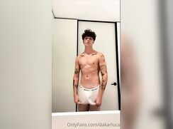 fit athlete tattoo guy strip only underwear bulge