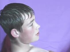 cute face guy lying down waking cum cam