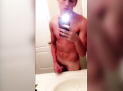 cute guy wanking in front the bathroom mirrow