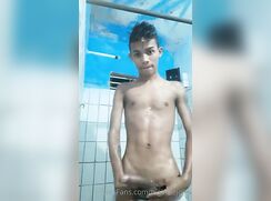 Latino washes himself and he rides his cock