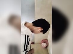 male student ejaculates in the toilet
