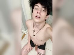 Rolling his eyes and moaning