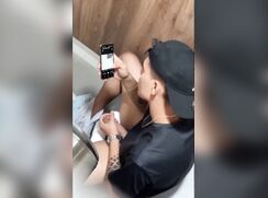 Lad spied on in the cubicle.