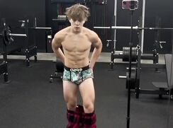 bodybuilder showing off legs