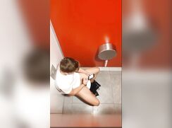 TEEN JERKS OFF IN  PUBLIC TOILET