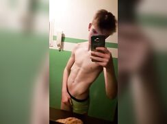 Cute boy shows off in bathroom, no cum
