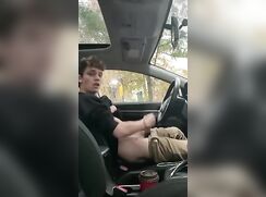 Young boy jerking off in a car outdoor cum