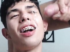 Happy Angelic guy with sweet creamy goodness on his face boys porn