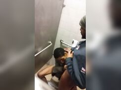 Public blowjob in a bathroom stall