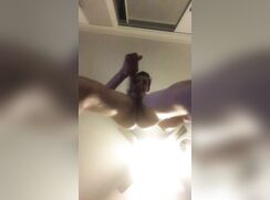 Muscle boy strips and wanks (no cum) view from below