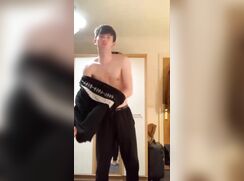 Twink strips and pisses on himself in bath