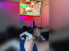 Twink Gets Handjob But Can’t Be Distracted From Games Console boys porn