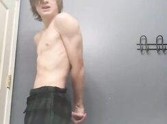 Boy flexes, not nude