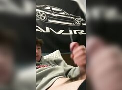 cute guy in bed spraying an amazing cumshot