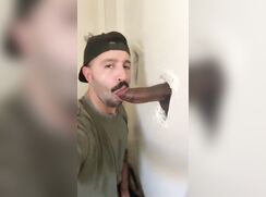 Black cock in the glory hole