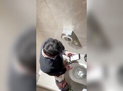 Asian twink jerk and cum in pubic toilet.