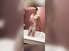 Gamer boy teases in shower