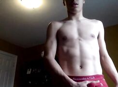 Latino in red underwear wanks and cums