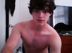 cute fit brunette on bed  jerking off