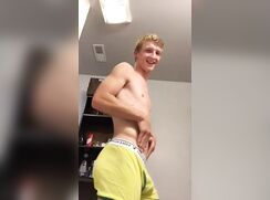 Blond muscle boy in yellow underwear slowly strips and shows ass