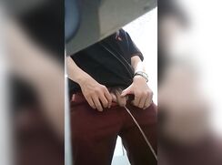 Cute uncut Asian boy urinating