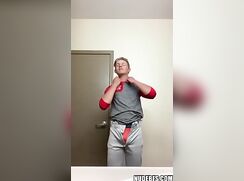 20-something sweaty sporty guy gets naked and shows off his hard cock