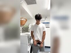 Cute face 18yo shows his rock hard uncut cock in the laundry