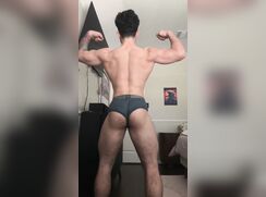 Hot bodybuilder Julian flexing