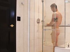 Gorgeous guy with great dick showers and has an unexpected guest